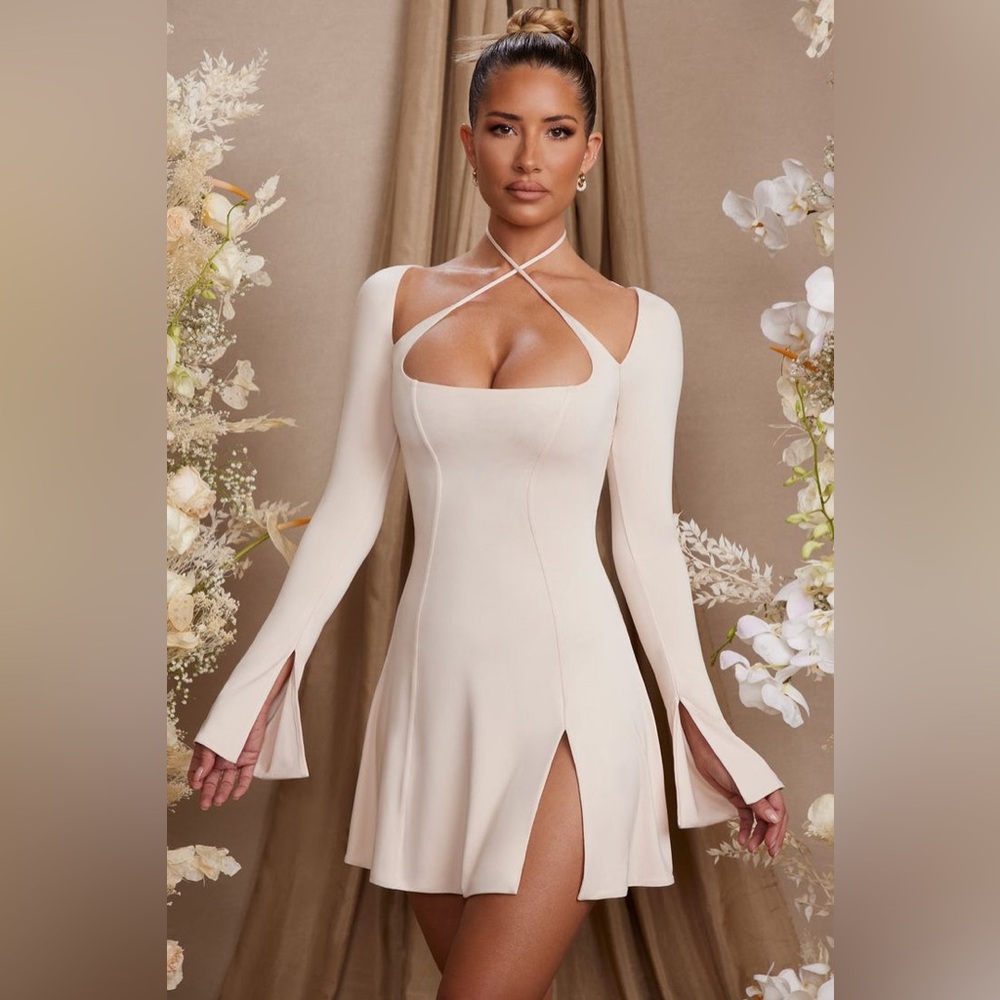 SALOME Oh polly
Long Sleeve Cross Over Strap Mini Dress in cream